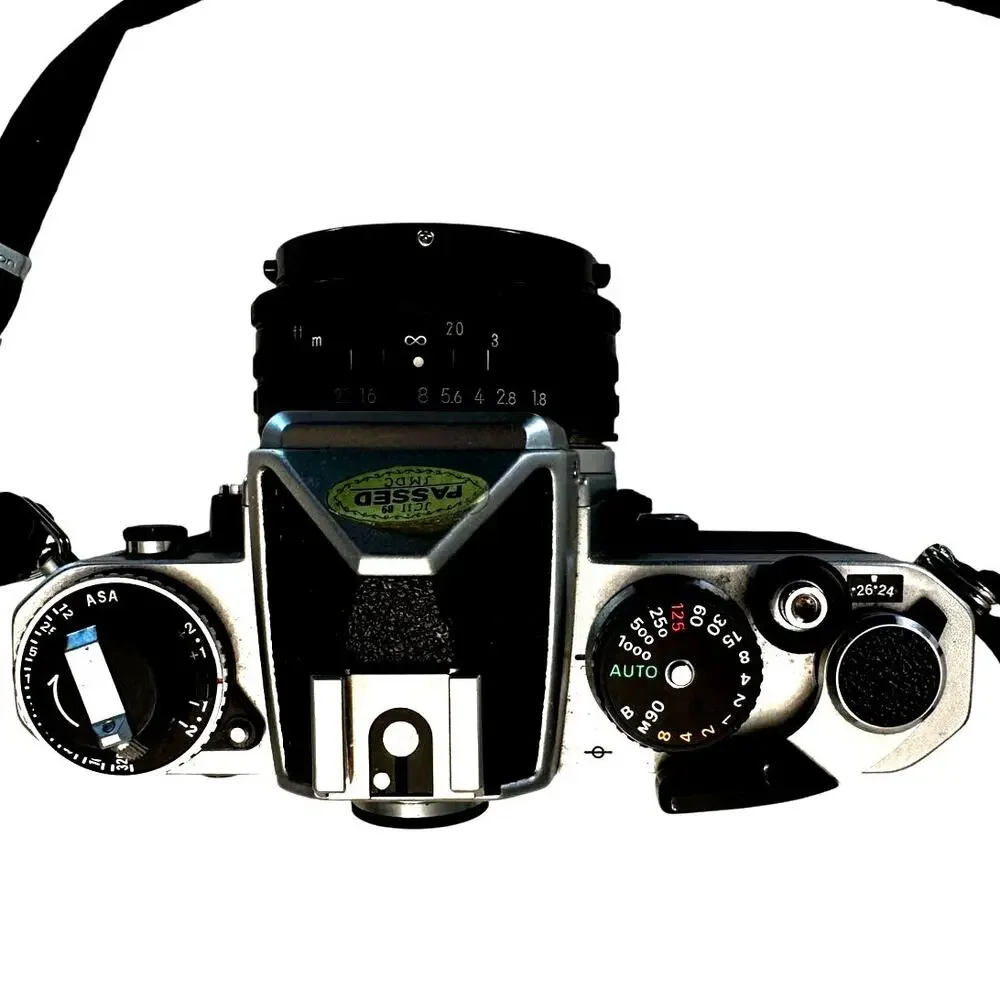 Nikon FM 35mm SLR Film Camera with Nikon Series E 150mm 1.8 Lens